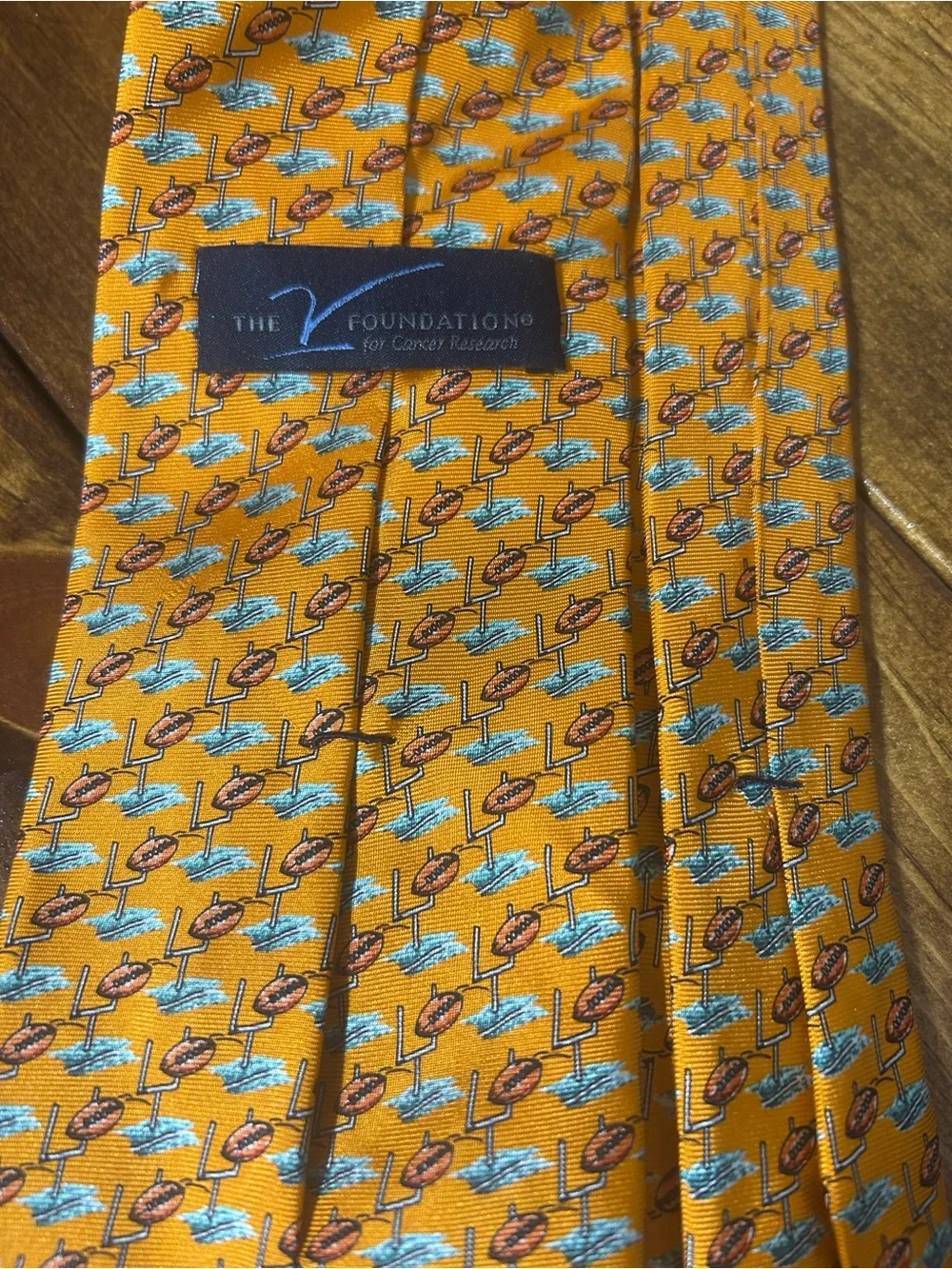 Men's Orange Patterned Necktie with Blue Accents football and goal posts